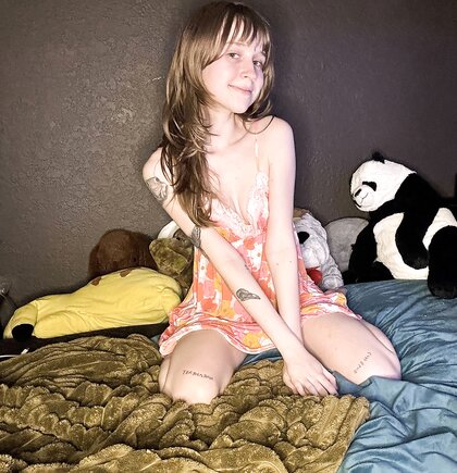 Sexy amateur teen Teensy Bella poses seductively in her nightgown