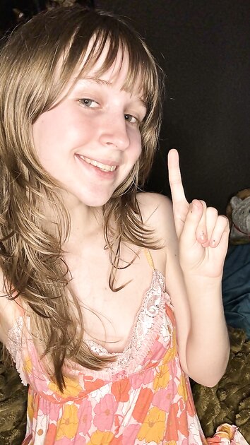 Sexy amateur teen Teensy Bella poses seductively in her nightgown