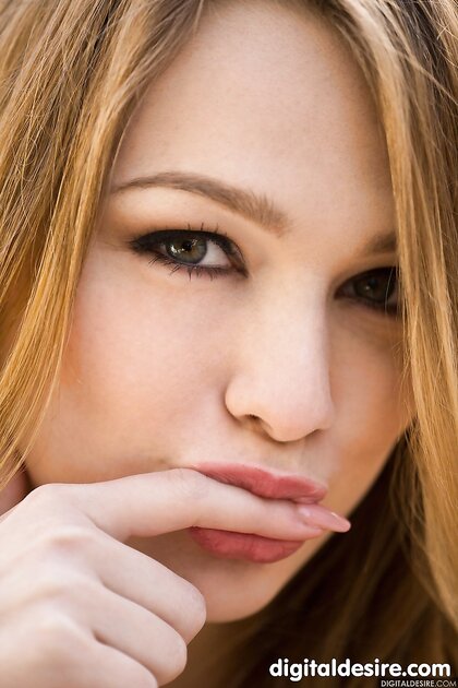 Alluring babe Alaina Fox shows her trimmed pussy up close outdoors