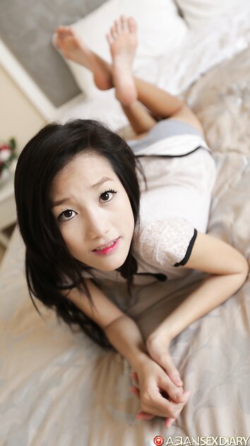 Asian girl Mi shows off her petite body & gives a big dick a POV ride