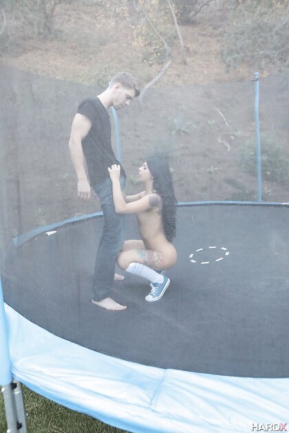 Brazilian teenage nympho Gina Valentina enjoys anal outdoor sex on trampoline