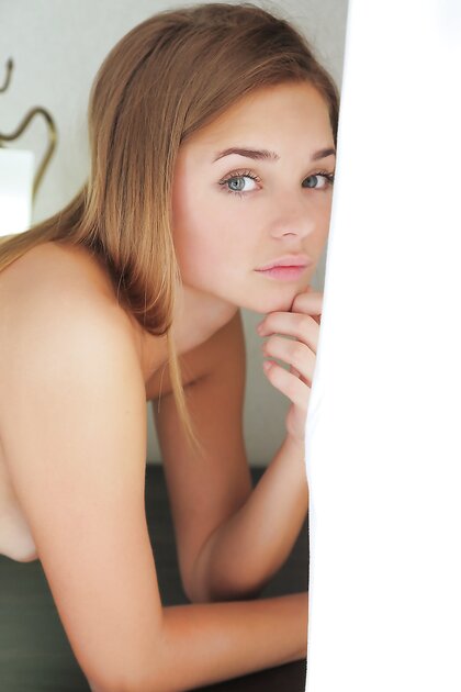 Glamorous teen with amazing eyes Colleen A showing her plump shaved pussy