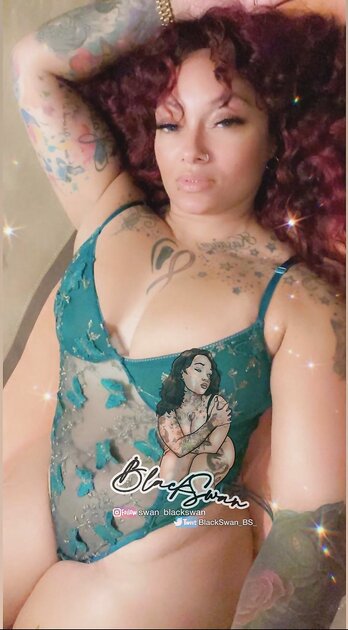 Thick tatted redbone Black swan